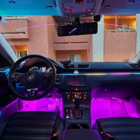 Car Interior with Ambient Purple LED Lighting and Advanced Stereo System