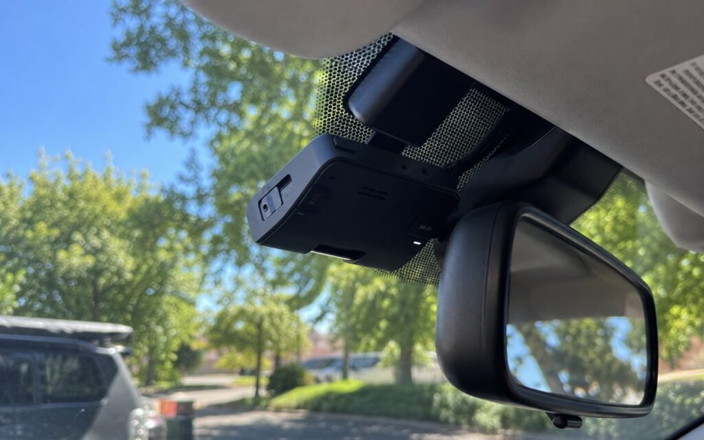 Car Interior Featuring Dashcam Installation Near Me on Rearview Mirror