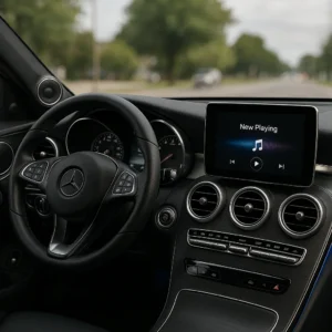 Car Interior with Apple CarPlay Displaying Music Controls